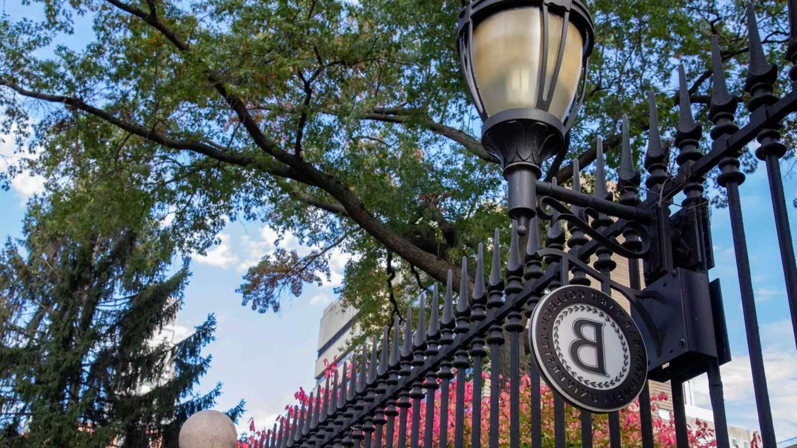 Barnard campus gates with the Barnard "B" sign